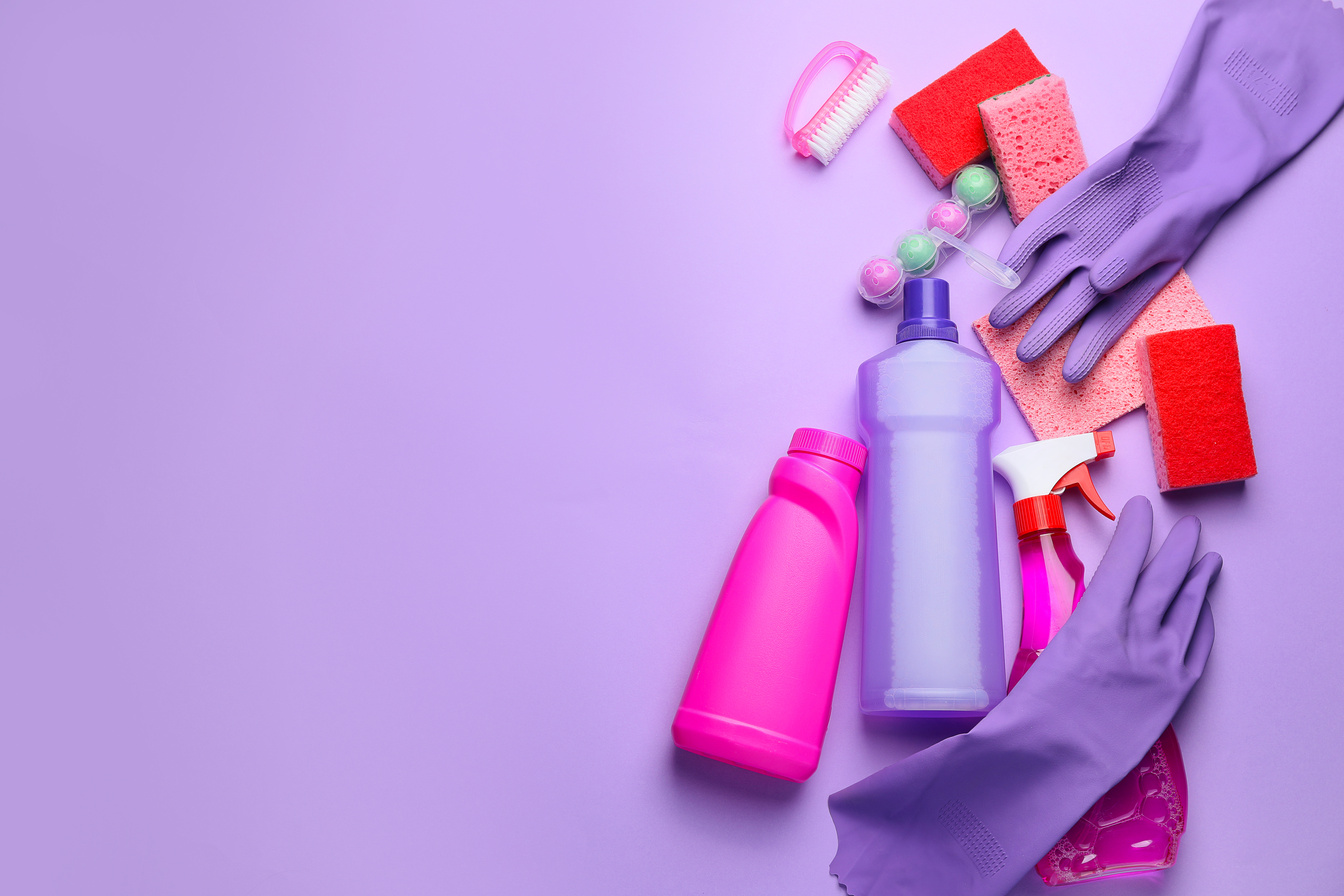 Set of Cleaning Supplies on Color Background